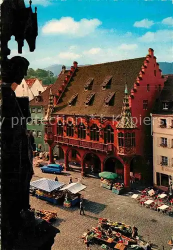 AK / Ansichtskarte Freiburg Breisgau Muensterplatz mit Kaufhaus Kat. Freiburg im Breisgau