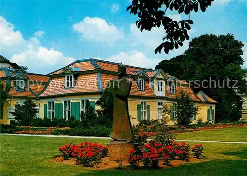 AK / Ansichtskarte Wolfenbuettel Lessinghaus mit Denkmal Statue Kat. Wolfenbuettel