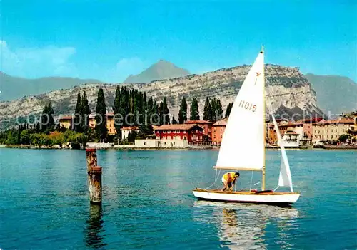 AK / Ansichtskarte Torbole Lago di Garda Ansicht vom Gardasee aus Segelboot Kat. Italien