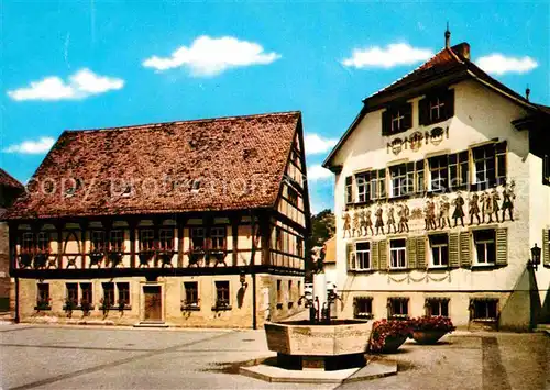 AK / Ansichtskarte Bad Kissingen Rathausplatz Brunnen Fachwerkhaus Fassadenmalerei Kat. Bad Kissingen