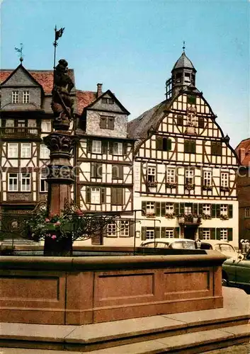 AK / Ansichtskarte Butzbach Marktplatz Brunnen Fachwerkhaeuser Kat. Butzbach