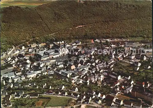 AK / Ansichtskarte Pruem Eifel Waldstadt Fliegeraufnahme mit Basilika Kat. Pruem