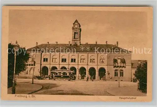 AK / Ansichtskarte Strassenbahn Freiburg im Breisgau Hauptbahnhof Bahnpoststempel Frankfurt Basel Kat. Strassenbahn