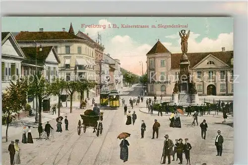 AK / Ansichtskarte Strassenbahn Freiburg im Breisgau Kaiserstrasse Siegesdenkmal  Kat. Strassenbahn