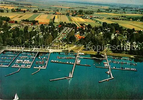 AK / Ansichtskarte Hude Oldenburg Fliegeraufnahme Hafen Helmut Reuke B?ckerei Kat. Hude (Oldenburg)