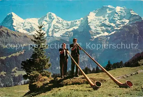 AK / Ansichtskarte Alphorn Alphornblaeser Muerren Eiger Moench Jungfrau  Kat. Musik