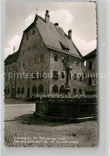 AK / Ansichtskarte Dinkelsbuehl Altes Rathaus Loewenbrunnen Kat. Dinkelsbuehl