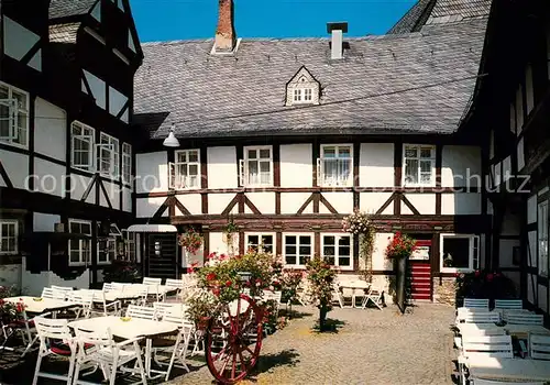 AK / Ansichtskarte Goslar Weisser Schwan in der Muenzstrasse Zinnfiguren Museum Fachwerk Restaurant Kat. Goslar