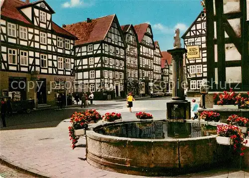 AK / Ansichtskarte Melsungen Fulda Marktbrunnen Altstadt Fachwerkhaeuser Kat. Melsungen