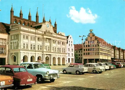 AK / Ansichtskarte Rostock Mecklenburg Vorpommern Rathaus und Haus Sonne Platz Kat. Rostock