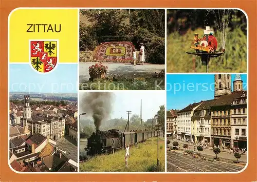 AK / Ansichtskarte Zittau Blumenuhr Schleifermaennelbrunnen Rathaus Schmalspurbahn Platz der Jugend Kat. Zittau