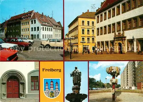 AK / Ansichtskarte Freiberg Sachsen Markt Schoenlebehaus August Bebel Strasse Portal Brunnen Denkmal Strasse des Friedens Kat. Freiberg