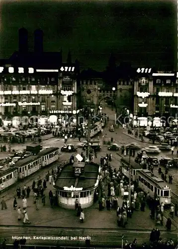 AK / Ansichtskarte Muenchen Karlsplatzrondell bei Nacht Kat. Muenchen