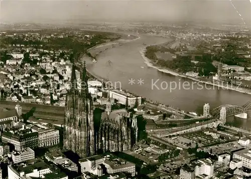 AK / Ansichtskarte Koeln Rhein Stadtbild mit Dom Fliegeraufnahme Kat. Koeln