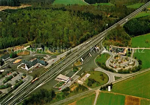 AK / Ansichtskarte Gruenberg Hessen Fliegeraufnahme Bundesautobahn Raststaetten Hotel Reinhardshain Kat. Gruenberg