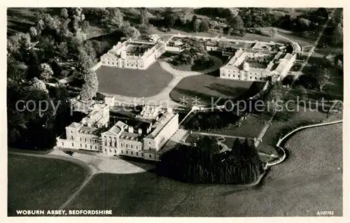 AK / Ansichtskarte Woburn Mid Bedfordshire Abbey aerial view Kat. Mid Bedfordshire