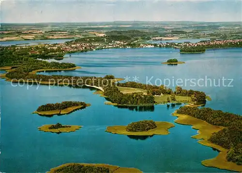 AK / Ansichtskarte Ploen See Blick ueber die Prinzeninsel auf die Stadt Fliegeraufnahme Kat. Ploen