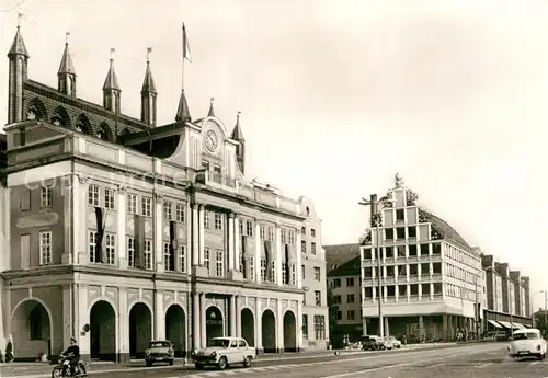 AK / Ansichtskarte Rostock Mecklenburg Vorpommern Haus Sonne Rathaus Kat. Rostock