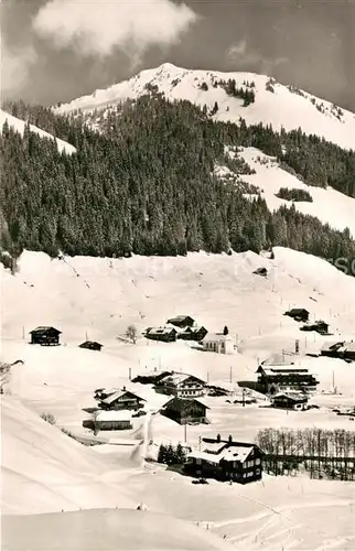 AK / Ansichtskarte Baad Mittelberg Kleinwalsertal Winterpanorama mit Walmendingerhorn Kat. Mittelberg