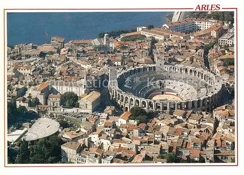 AK / Ansichtskarte Arles Bouches du Rhone Theatre Antique et les Arenes Fliegeraufnahme Kat. Arles