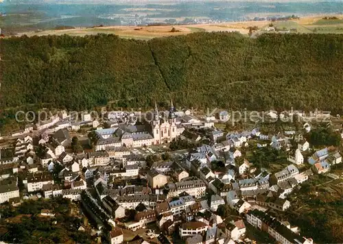 AK / Ansichtskarte Pruem Eifel Waldstadt der Eifel mit Basilika Fliegeraufnahme Kat. Pruem