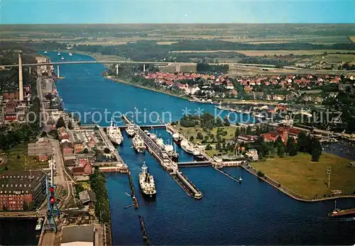 AK / Ansichtskarte Holtenau Kiel Holtenauer Schleusen mit Hochbruecken Fliegeraufnahme Kat. Kiel