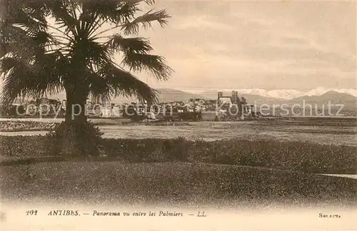 AK / Ansichtskarte Antibes Alpes Maritimes Panorama vu entre les Palmiers Kat. Antibes