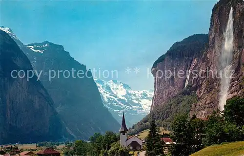 AK / Ansichtskarte Lauterbrunnen BE Staubbachfall mit Kirche und Grosshorn Kat. Lauterbrunnen