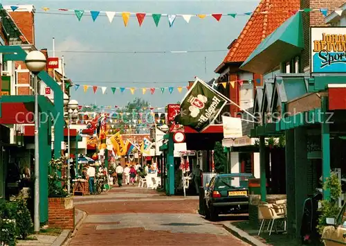 AK / Ansichtskarte Delfzijl Promenade Waterstraat geschmueckte Strassenpartie Kat. Delfzijl