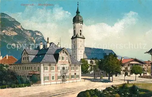 AK / Ansichtskarte Garmisch Partenkirchen Marktplatz mit Kirche Kat. Garmisch Partenkirchen