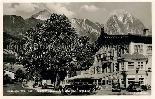 AK / Ansichtskarte Garmisch Partenkirchen Clausings Hotel Post gegen Zugspitzgruppe Kat. Garmisch Partenkirchen