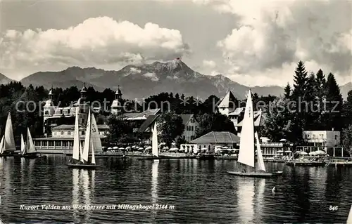 AK / Ansichtskarte Velden Woerther See Ansicht vom See aus Segelboote Mittagskogel Karawanken Kat. Velden am Woerther See