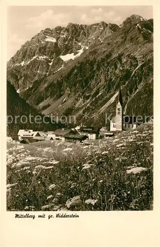 AK / Ansichtskarte Mittelberg Kleinwalsertal Bergwiese Kirche Grosser Widderstein Allgaeuer Alpen Kat. Oesterreich