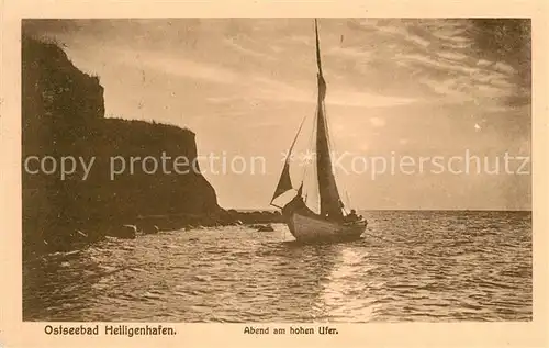 AK / Ansichtskarte Heiligenhafen Ostseebad Abend am hohen Ufer Segelboot Kat. Heiligenhafen