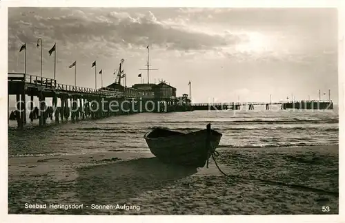 AK / Ansichtskarte Heringsdorf Ostseebad Usedom Sonnenaufgang Seebruecke Kat. Heringsdorf