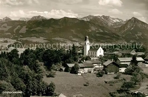 AK / Ansichtskarte Ofterschwang Teilansicht mit Kirche Alpenpanorama Kat. Ofterschwang