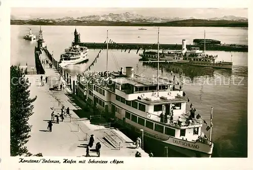 AK / Ansichtskarte Dampfer Seitenrad Deutschland Konstanz Bodensee Hafen Schweizer Alpen Kat. Schiffe