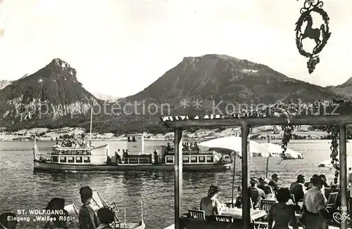 AK / Ansichtskarte St Wolfgang Wolfgangsee Eingang Weisses Roessl Terrasse Dampfer Kat. St. Wolfgang im Salzkammergut