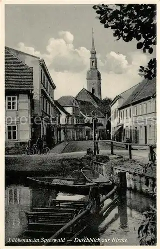 AK / Ansichtskarte Luebbenau Spreewald Durchblick zur Kirche Wasserstrasse Kahn Kat. Luebbenau