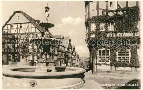 AK / Ansichtskarte Bad Wildungen Marktplatz Lindenstrasse Brunnen Loewen Apotheke Fachwerkhaeuser Altstadt Kat. Bad Wildungen