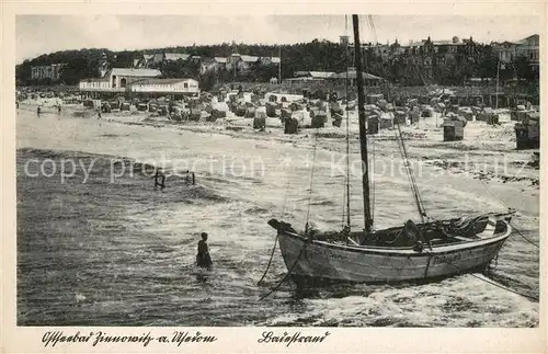 AK / Ansichtskarte Zinnowitz Ostseebad Badestrand Fischerboot