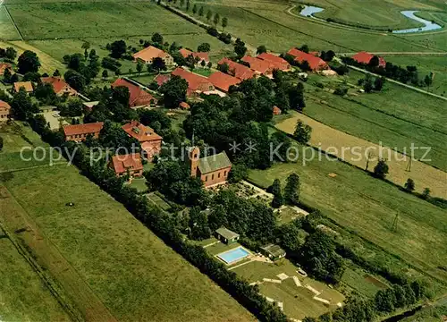 AK / Ansichtskarte Potshausen Fliegeraufnahme Landvolkshochschule Kirche Sportanlagen Kat. Ostrhauderfehn