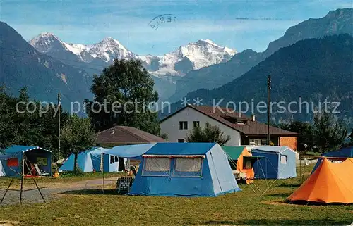 AK / Ansichtskarte Unterseen Jungfraucamp Campingplatz Eiger Moench Jungfrau Berner Alpen Kat. Unterseen