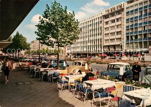 AK / Ansichtskarte Duesseldorf Belriner Allee Strassencafes Kat. Duesseldorf