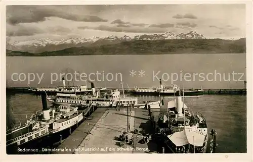 AK / Ansichtskarte Bodensee Region Dampferhafen mit Schweizer Bergen