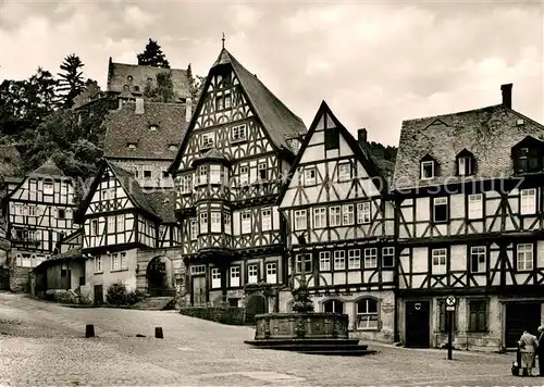 AK / Ansichtskarte Miltenberg Main Marktplatz Schnatterloch Fachwerkhaeuser Brunnen Kat. Miltenberg