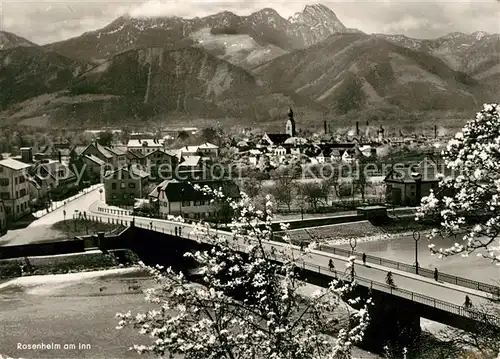 AK / Ansichtskarte Rosenheim Bayern Innbruecke Baumbluete Stadtpanorama mit Alpen Hafner Bildkarten Heimat und Berge Kat. Rosenheim