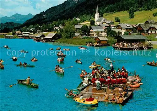 AK / Ansichtskarte Weissensee Kaernten Flosskonzert der Trachtenkapelle Kat. Weissensee