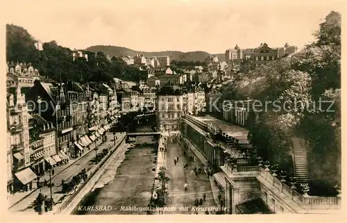 AK / Ansichtskarte Karlsbad Eger Muehlbrunnkolonnade mit Kreuzstrasse