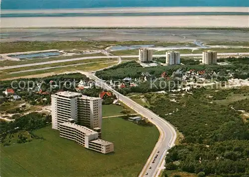 AK / Ansichtskarte Peter Ording St Fliegeraufnahme Hochhaeuser Schwimmbad Kat. Sankt Peter Ording